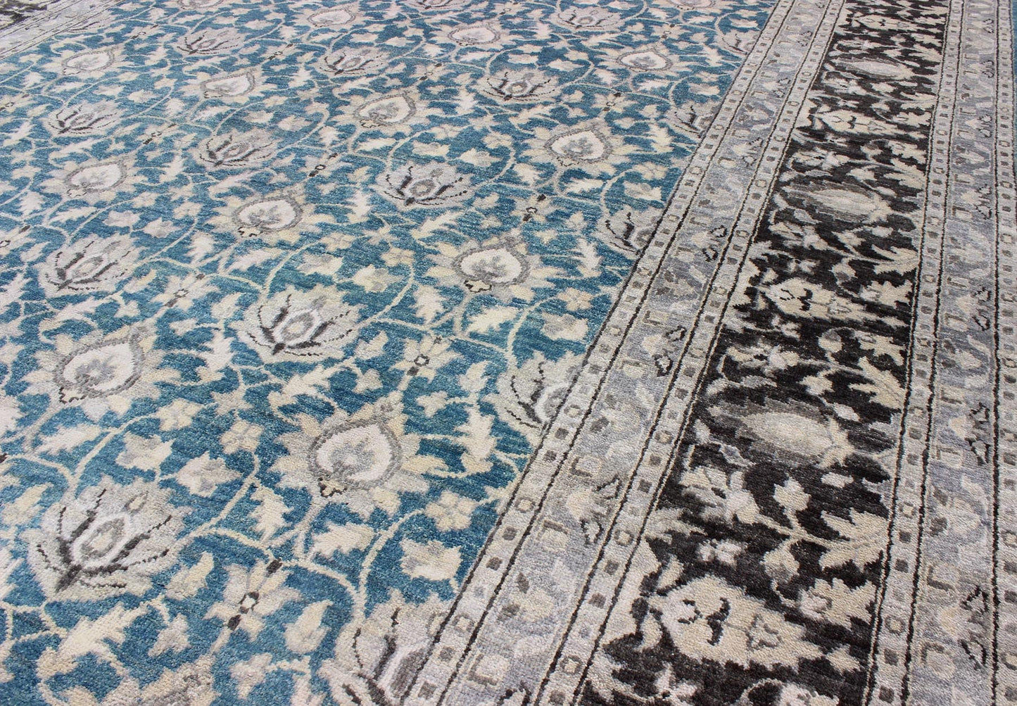 Modern Tabriz Rug in Wool With All - Over Design in Blue, Gray and Charcoal This hand knotted Tabriz rug features a beautiful all - over design rendered in grays, silver, and charcoal and blue tones. The entirety of the piece is enclosed within a c... - Keivan Woven ArtsOB - 9312987 - 6480001 - 9655Rug