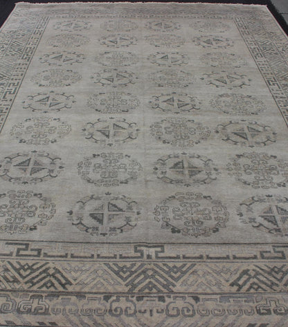 Large Khotan rug with silver, gray, Blue gray, charcoal and a neutral color palette and all - over medallion design, rug OB - 9261273, country of origin / type: India/ Khotan This hand knotted Khotan rug features a beautiful all - over design rendered... - Keivan Woven ArtsOB - 9356765 - 12206Rug