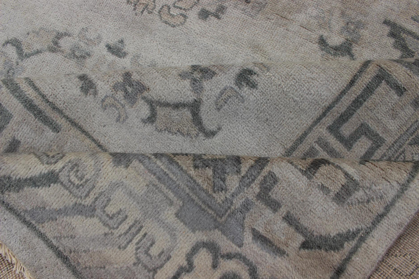 Large Khotan rug with silver, gray, Blue gray, charcoal and a neutral color palette and all - over medallion design, rug OB - 9261273, country of origin / type: India/ Khotan This hand knotted Khotan rug features a beautiful all - over design rendered... - Keivan Woven ArtsOB - 9356765 - 12206Rug