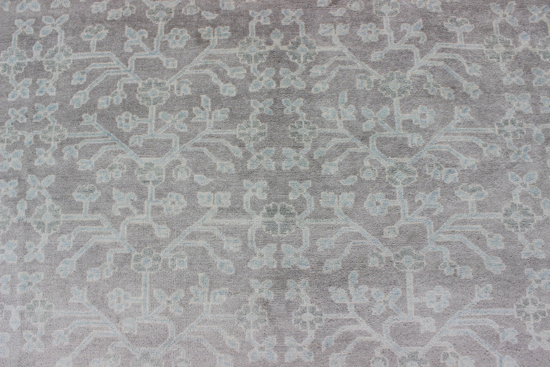 Keivan Woven Arts Khotan Rug in Wool with All - Over Design. Keivan Woven Arts; rug OB - 9379586 - 6460001, country of origin / type: India / Khotan, circa Early 21st Century. Measures: 8'9 x 11'9 This modern Indian Khotan rug has been hand - knotted in... - Keivan Woven ArtsOB - 9379586 - 6460001 - 9677Rug