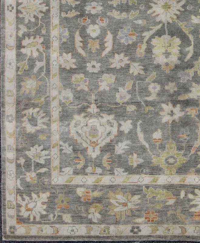 Keivan Woven Arts Oushak in Gray Green, Taupe and Orange Accents Gray background Oushak with All - Over Floral Design in Green and Orange Gray Oushak Rug, Keivan Woven Arts rug/OB - 393788, country of origin / type: India / Oushak, circa Early - ... - Keivan Woven ArtsOB - 9393788 - 8165Rug