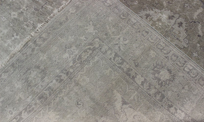 Modern Oushak Light Colored Rug in Taupe, Sand, Light Purple/Lavender and Grey. Measures: 9' x12'. This exquisite Vintage Oushak rug displays a fun mlange of floral and geometric designs, rendered in gray and lavender enclose within a bo... - Keivan Woven ArtsOB - 9413053 - 8169Rug