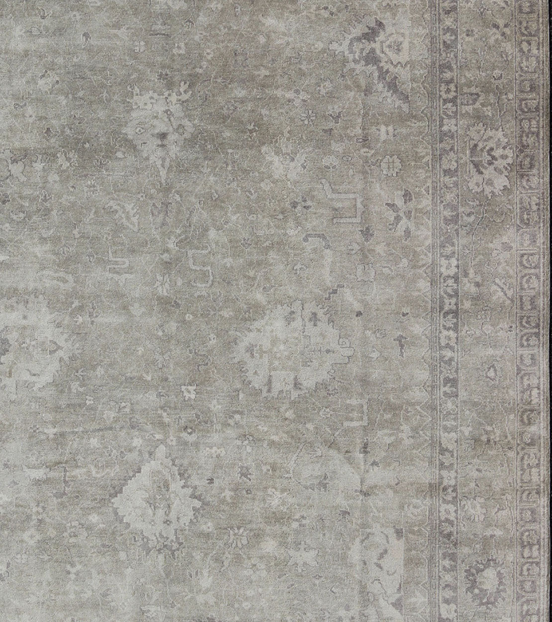 Modern Oushak Light Colored Rug in Taupe, Sand, Light Purple/Lavender and Grey. Measures: 9' x12'. This exquisite Vintage Oushak rug displays a fun mlange of floral and geometric designs, rendered in gray and lavender enclose within a bo... - Keivan Woven ArtsOB - 9413053 - 8169Rug