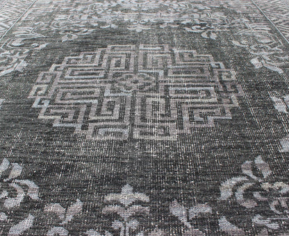 Keivan Woven Arts Modern Khotan Hand Knotted Wool Rug in Charcoal & Gray. This modern Khotan rug has been hand - knotted features an all - over, sub - geometric late central medallion design rendered in charcoal and gray tones. A complementary border encompa... - Keivan Woven ArtsOB - 9444206 - 56230109 - 9308Rug