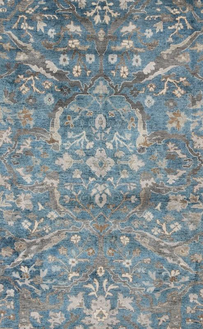 Blue and Gray Vintage Oushak Rug. Measures: 9' x 12'. This vintage Oushak carpet from Turkey features a all over traditional Oushak design rendered in tones of blue and gray, set atop a blue background. The central field features floating motifs ... - Keivan Woven ArtsOB - 9458373 - 06470003 - 8175Rug