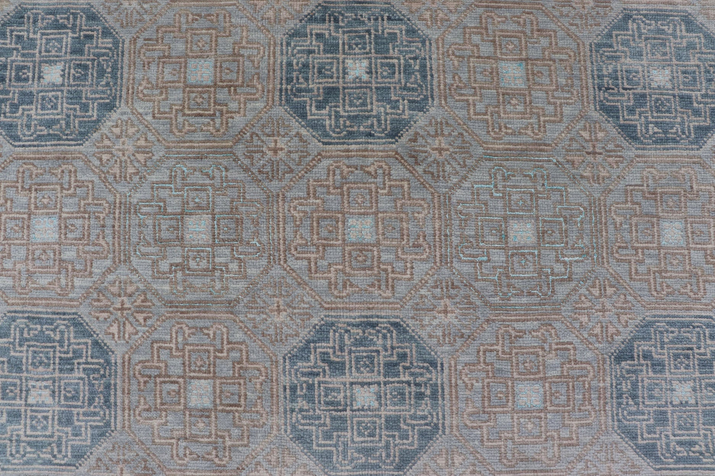 Modern Hand Knotted Khotan in Wool with All - Over Medallion Design in Blue and Earthy Tones This modern Indian Khotan rug has been hand - knotted in wool and features an all - over, sub - geometric medallion design rendered in blue and earthy tones. A ... - Keivan Woven ArtsOB - 9538562 - 98000069 - 15490Rug