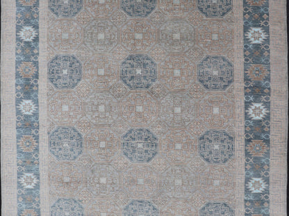 Modern Hand Knotted Khotan in Wool with All - Over Medallion Design in Blue and Earthy Tones This modern Indian Khotan rug has been hand - knotted in wool and features an all - over, sub - geometric medallion design rendered in blue and earthy tones. A ... - Keivan Woven ArtsOB - 9538562 - 98000069 - 15490Rug
