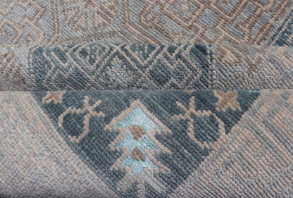 Modern Hand Knotted Khotan in Wool with All - Over Medallion Design in Blue and Earthy Tones This modern Indian Khotan rug has been hand - knotted in wool and features an all - over, sub - geometric medallion design rendered in blue and earthy tones. A ... - Keivan Woven ArtsOB - 9538562 - 98000069 - 15490Rug