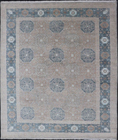 Modern Hand Knotted Khotan in Wool with All - Over Medallion Design in Blue and Earthy Tones This modern Indian Khotan rug has been hand - knotted in wool and features an all - over, sub - geometric medallion design rendered in blue and earthy tones. A ... - Keivan Woven ArtsOB - 9538562 - 98000069 - 15490Rug