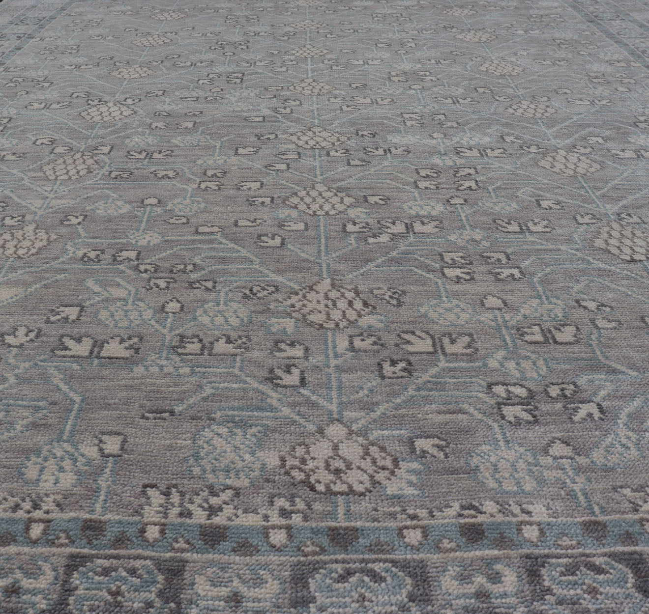 Modern Khotan Design Rug in Wool with All - Over Design By Keivan Woven Arts This modern Indian Khotan rug has been hand - knotted in wool and features an all - over, sub - geometric design rendered in muted tones. A complementary, multi - tiered border ... - Keivan Woven ArtsOB - 9543192 - 98000090 - 15496