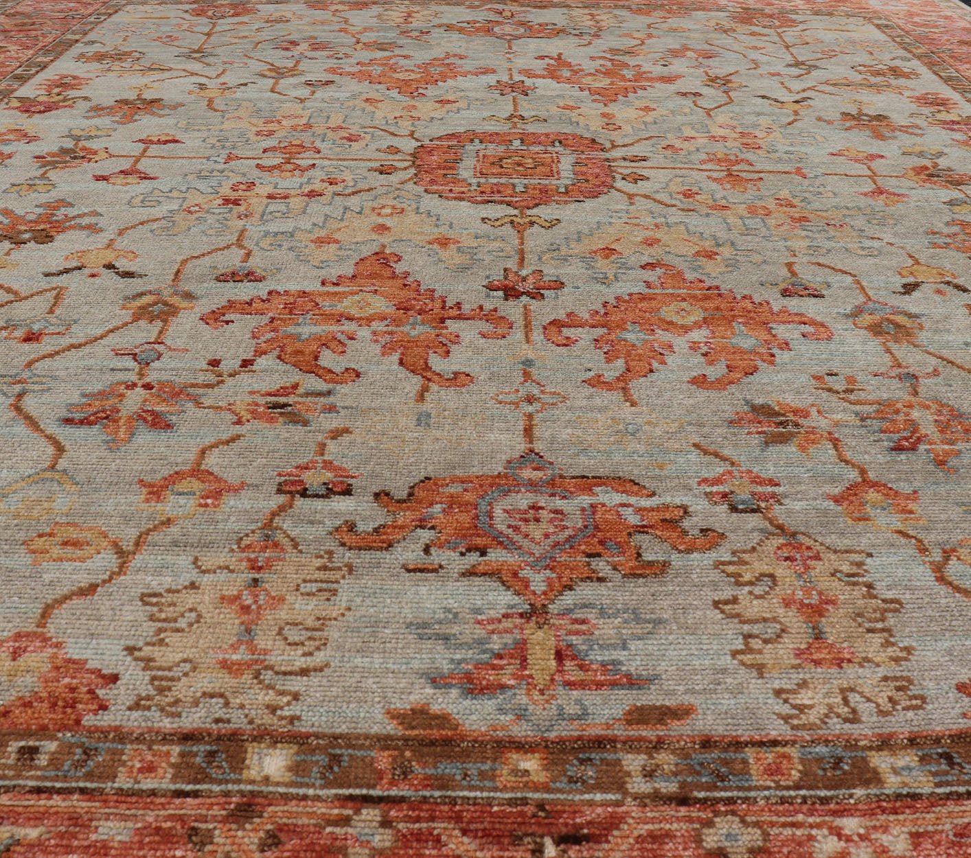 Burnt Orange and Cool Gray Modern Floral Oushak with All - Over Design Measures 8'0 x 9'10 This modern Indian Oushak was hand - knotted during the 2010's. The cool blue - gray field is heavily decorated in floral and leaflet motifs, commonly ... - Keivan Woven ArtsOB - 9570118 - 1030026 - 21078Rug