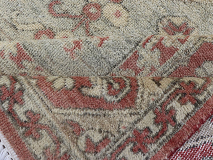 Modern Oushak Rug in Wool with Medallion Design in Light Blue and Coral This modern Indian Khotan rug has been hand - knotted in wool and features a floral medallion design rendered in light blue and coral tones. A complementary, multi - tiered bor... - Keivan Woven ArtsOB - 9580377 - 83230118 - 15502