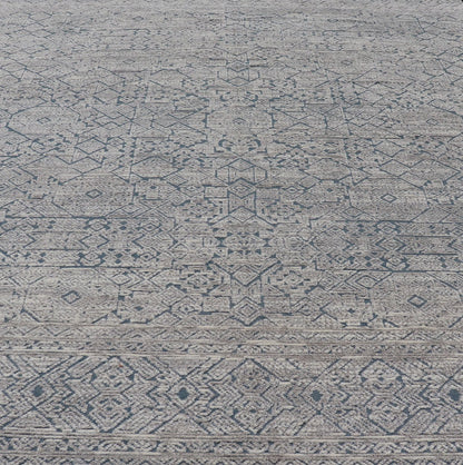 Hand - Knotted Modern Rug in Wool with All - Over Design in Blue and Cream This Modern Indian rug has been hand - knotted in wool and features an all - over, sub - geometric design rendered in blue and cream tones. A complementary, multi - tiered border en... - Keivan Woven ArtsOB - 9599733 - 18174Rug