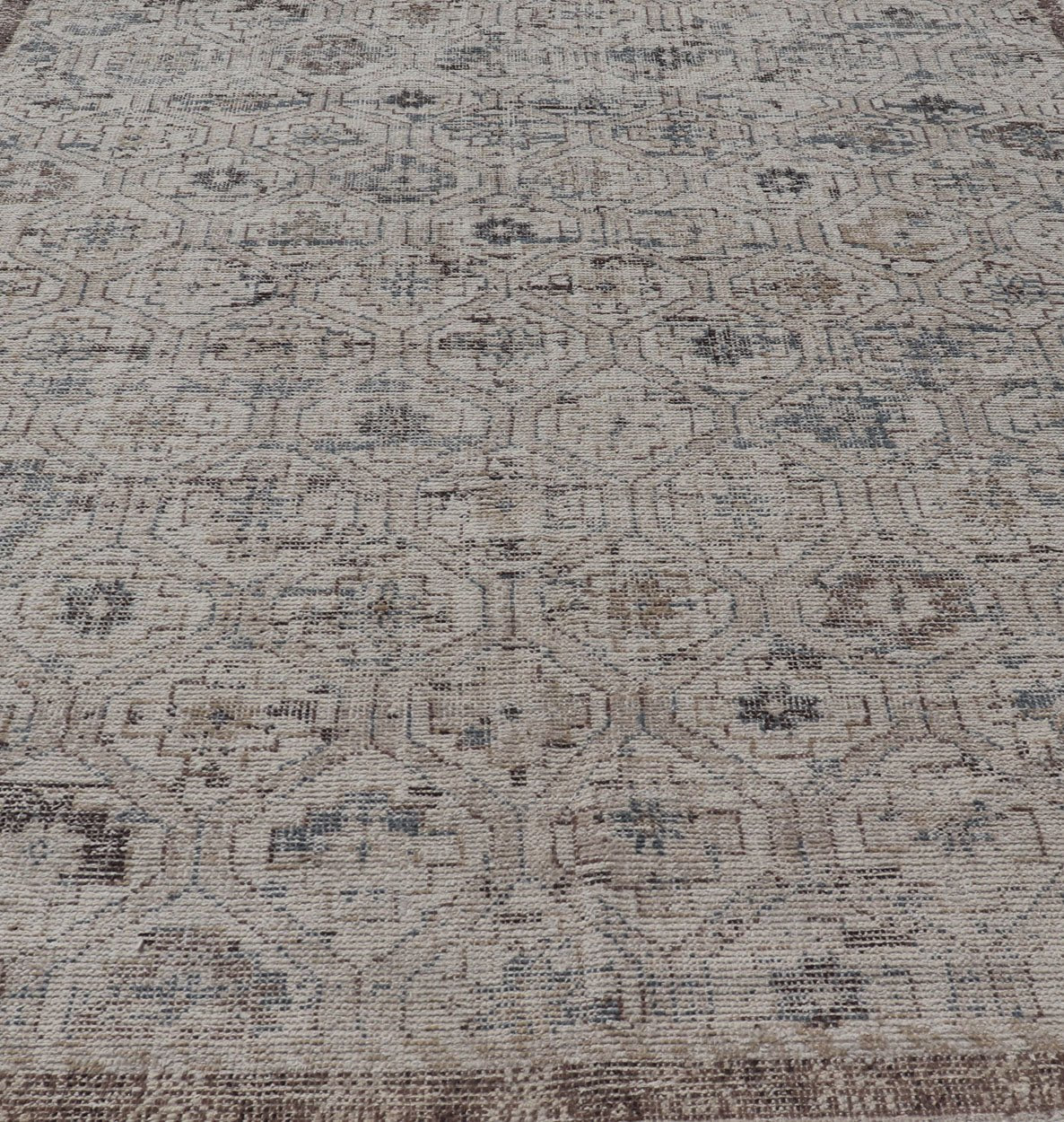 Modern Hand - Knotted Oushak Rug in Wool With Sub - Geometric Design in Brown and Blue This modern tribal Oushak rug has been hand - knotted in wool. The rug features a modern, all - over sub - geometric design, replete with various motifs rendered in bl... - Keivan Woven ArtsOB - 9729766 - 18192Rug