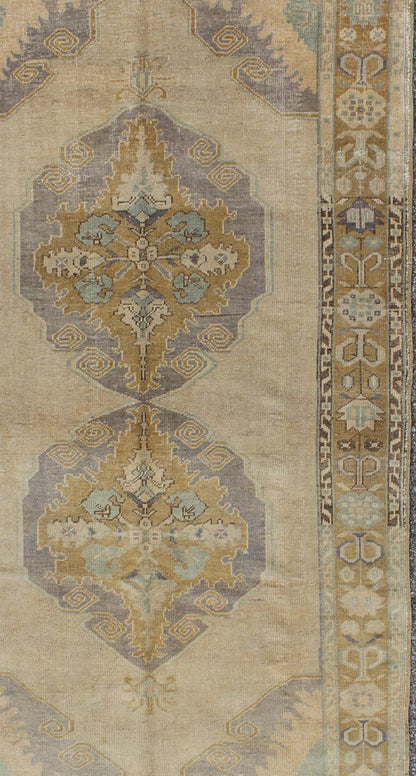 Vintage Gallery Turkish Oushak Rug With Floral Medallions in Earthy Tones and Lavender Keivan Woven Arts / rug OSM - 09, country of origin / type: Turkey / Oushak, circa 1940 Measures: 4'1 x 8'7. This vintage Oushak beautifully illustrates the impr... - Keivan Woven ArtsOSM - 09 - 4504Rug