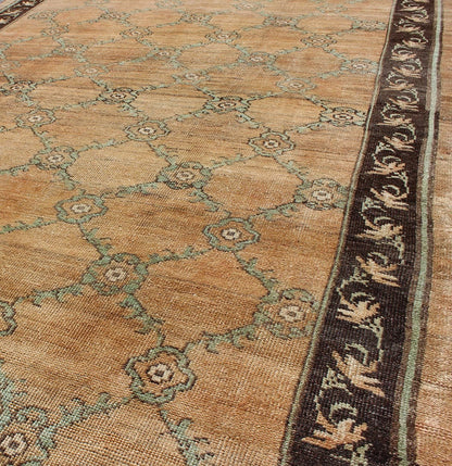 Gallery Turkish Oushak Rug This magnificent Oushak beautifully illustrates the impressive craftsmanship and design of Turkish weavers. The muted design of repeating flowers in light green on a orange background flows through the rug's center fie... - Keivan Woven ArtsOSM - 16 - 4510Rug