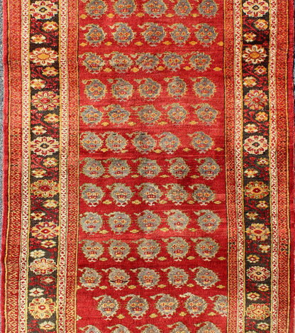 Red Turkish Oushak Carpet with All - Over Paisley Design and Central Red Field This unique Turkish Oushak carpet features an all - over design of intricate paisley shapes set atop a central field of bright red. The entire piece is encompassed by a f... - Keivan Woven ArtsOSM - 23 - 4518Rug