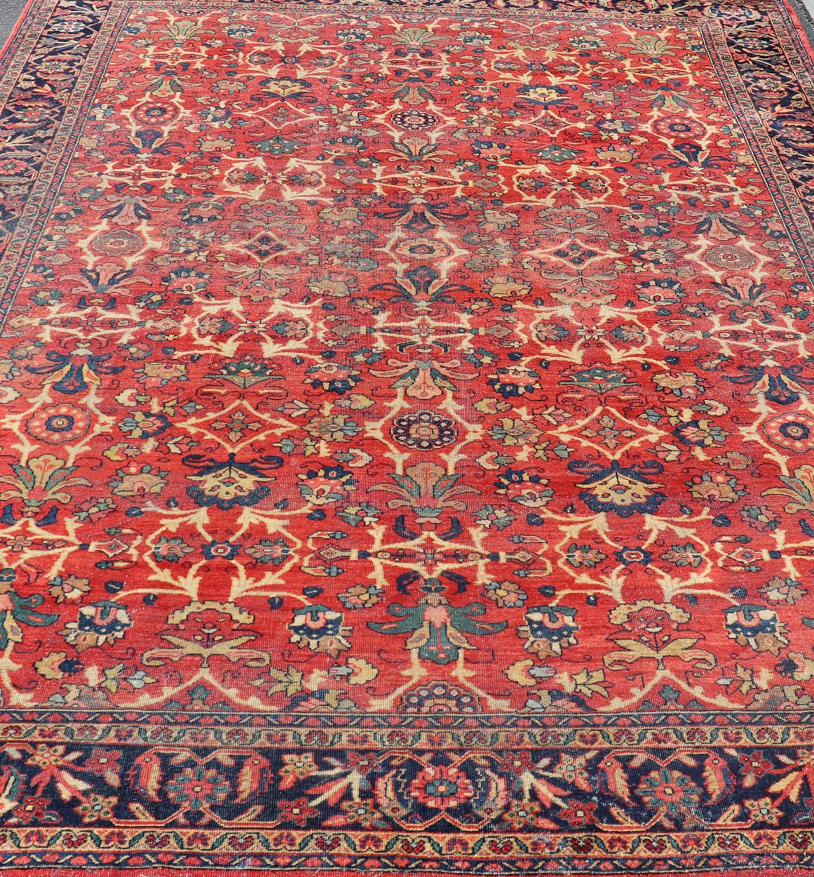Antique Hand - Knotted Persian Mahal Rug with All - Over Design on Red Field This antique hand - knotted Persian Mahal rug features an all - over sub - geometric floral design set upon a on red field. The entirety of this piece is enclosed within a compl... - Keivan Woven ArtsPTA - 200723 - 16672