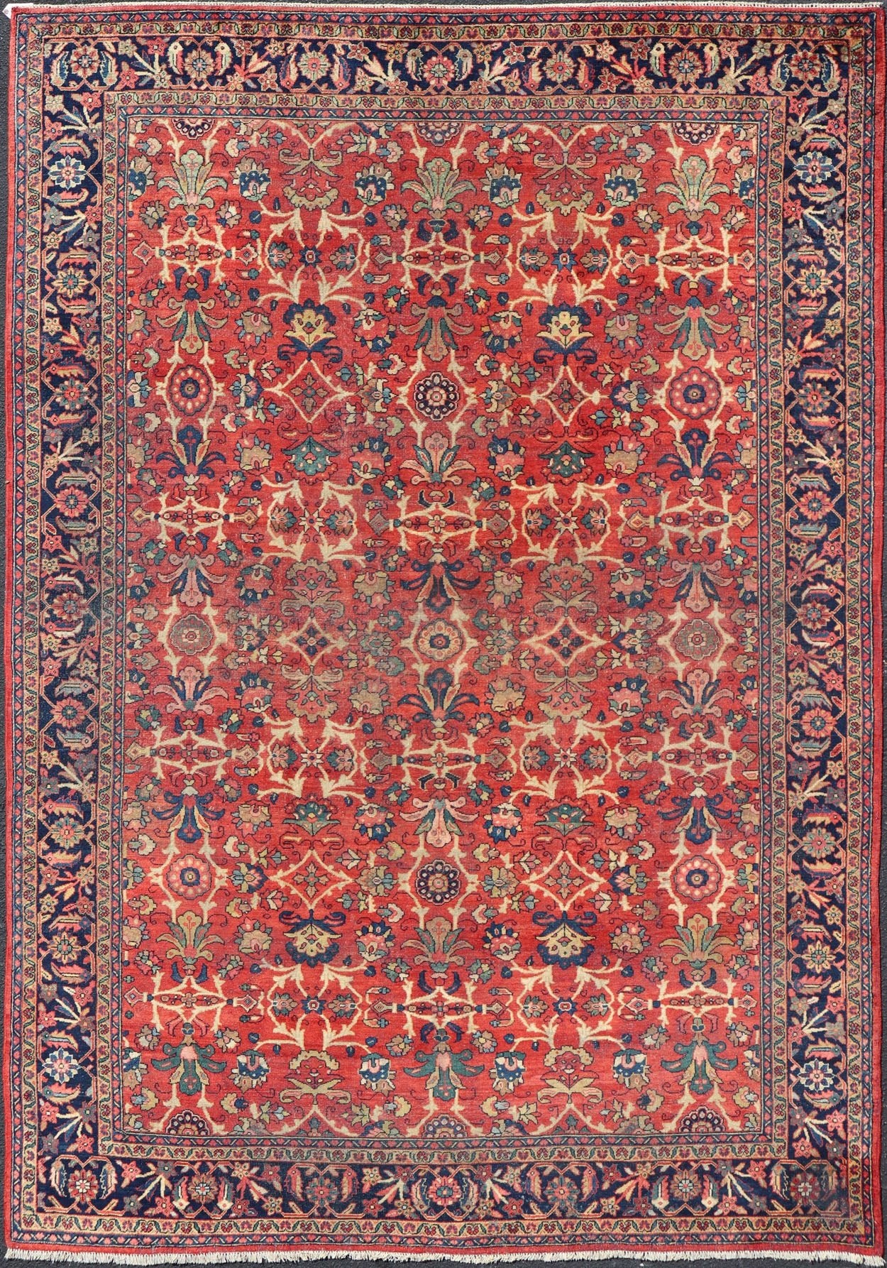Antique Hand - Knotted Persian Mahal Rug with All - Over Design on Red Field This antique hand - knotted Persian Mahal rug features an all - over sub - geometric floral design set upon a on red field. The entirety of this piece is enclosed within a compl... - Keivan Woven ArtsPTA - 200723 - 16672