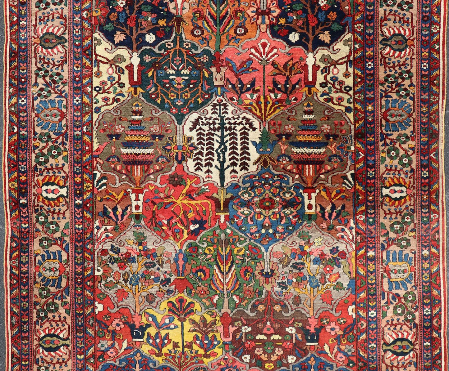 Antique Persian Bakhtiari Rug with Diamond Garden Design in Multicolor This magnificent Antique Bakhtiari Rug features an all - over diamond garden design replete in with a large variety of bold colors. The central design is enclosed within a co... - Keivan Woven ArtsPTA - 200731 - 16943Rug