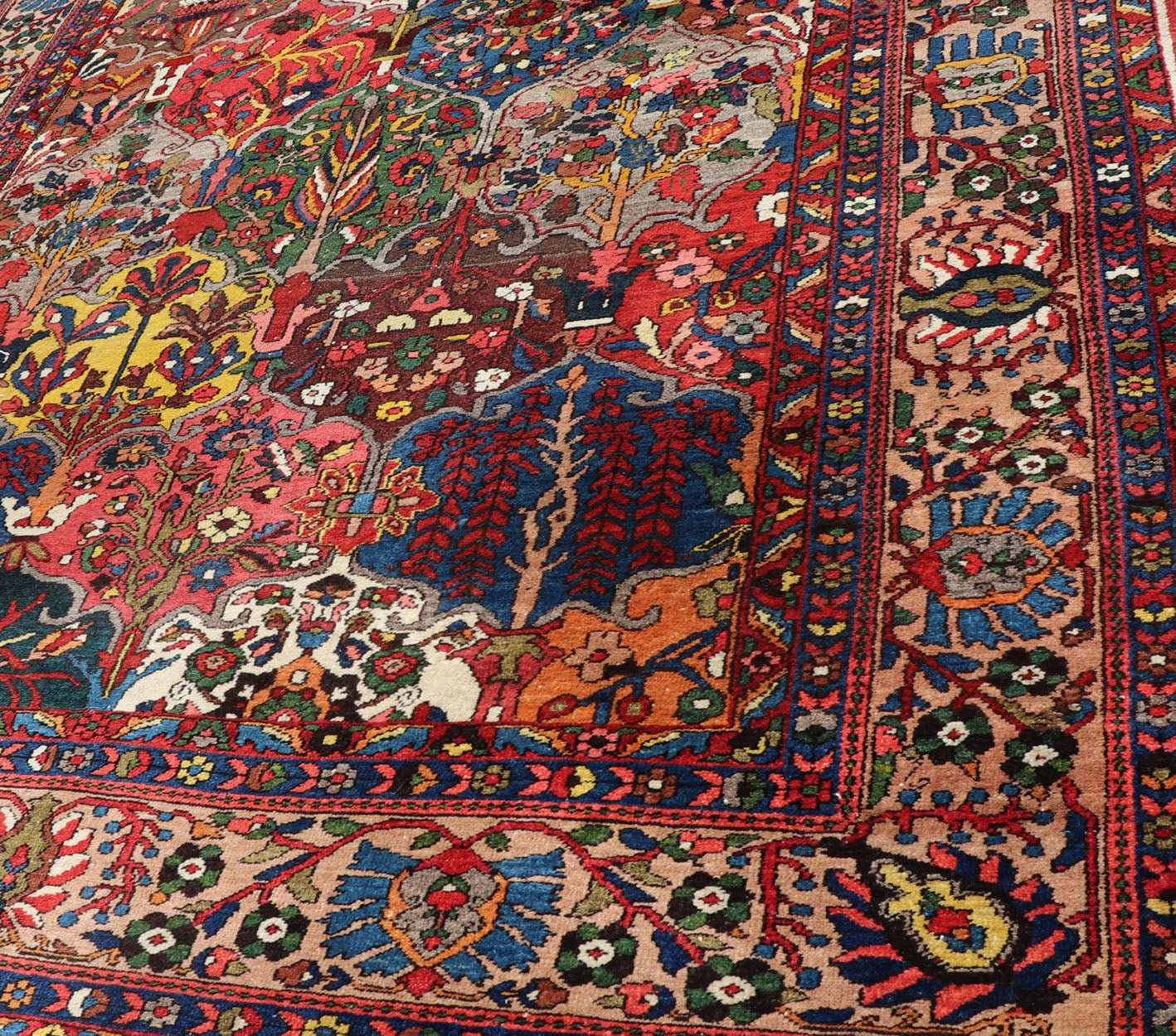Antique Persian Bakhtiari Rug with Diamond Garden Design in Multicolor This magnificent Antique Bakhtiari Rug features an all - over diamond garden design replete in with a large variety of bold colors. The central design is enclosed within a co... - Keivan Woven ArtsPTA - 200731 - 16943Rug