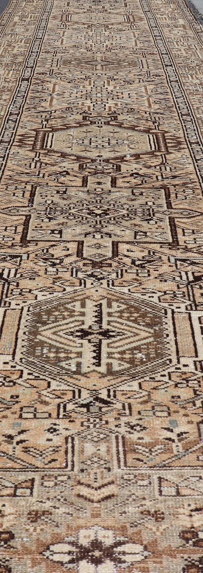 Vintage Persian Karadjeh Long Runner with Medallion Design in Natural Wool Tones This vintage 1940's Karadjeh features brown and sandy tones and majestic medallions within the field. The wide banded border holds a motif design that repea... - Keivan Woven ArtsPTA - 21001 - 18078