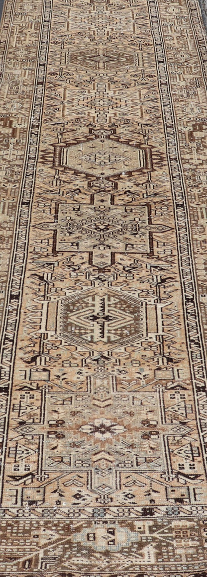 Vintage Persian Karadjeh Long Runner with Medallion Design in Natural Wool Tones This vintage 1940's Karadjeh features brown and sandy tones and majestic medallions within the field. The wide banded border holds a motif design that repea... - Keivan Woven ArtsPTA - 21001 - 18078