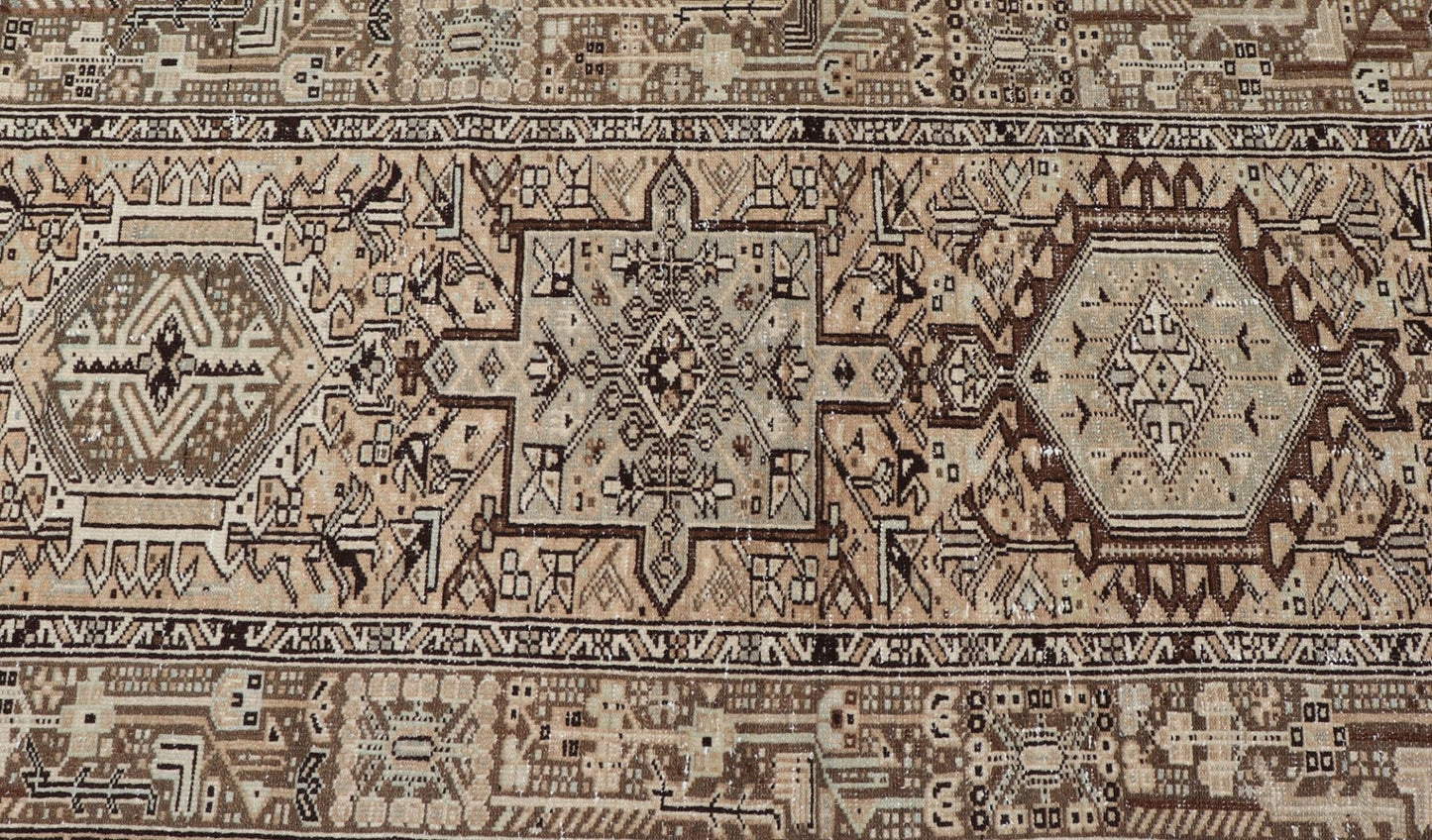 Vintage Persian Karadjeh Long Runner with Medallion Design in Natural Wool Tones This vintage 1940's Karadjeh features brown and sandy tones and majestic medallions within the field. The wide banded border holds a motif design that repea... - Keivan Woven ArtsPTA - 21001 - 18078Rug