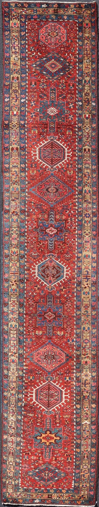 Antique Persian Heriz long Runner with Geometric medallions in Red, Teal, Orange, Blue, Yellow. Very Long antique Persian Heriz runner with geometric medallion design in red, blue and colorful tones, rug PTA - 21002 , country of origin / type: Ir... - Keivan Woven ArtsPTA - 21002 - 18006Rug