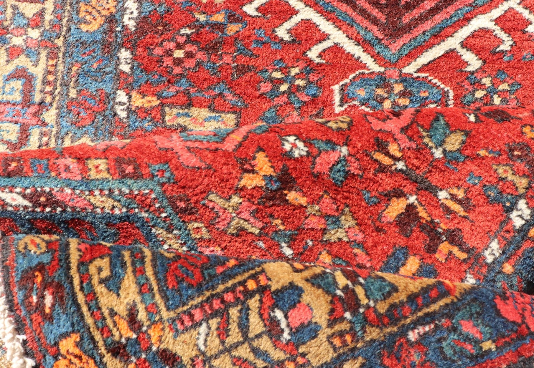 Antique Persian Heriz long Runner with Geometric medallions in Red, Teal, Orange, Blue, Yellow. Very Long antique Persian Heriz runner with geometric medallion design in red, blue and colorful tones, rug PTA - 21002 , country of origin / type: Ir... - Keivan Woven ArtsPTA - 21002 - 18006Rug