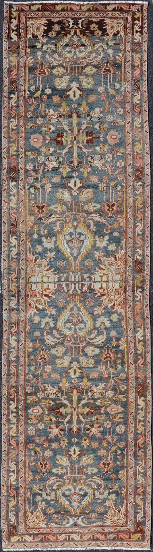 Antique Persian Malayer Runner All - Over Floral Design on A Blue Background This antique Persian Malayer runner is rendered in rich colors, from the blue background to the pink, coral, light yellow, brown, and light blue shown in the design... - Keivan Woven ArtsPTA - 21004 - 18084Rug