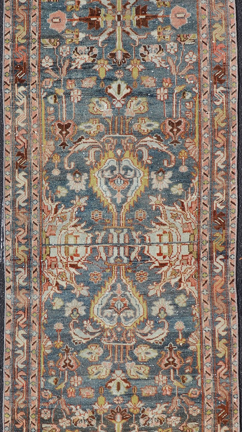 Antique Persian Malayer Runner All - Over Floral Design on A Blue Background This antique Persian Malayer runner is rendered in rich colors, from the blue background to the pink, coral, light yellow, brown, and light blue shown in the design... - Keivan Woven ArtsPTA - 21004 - 18084Rug