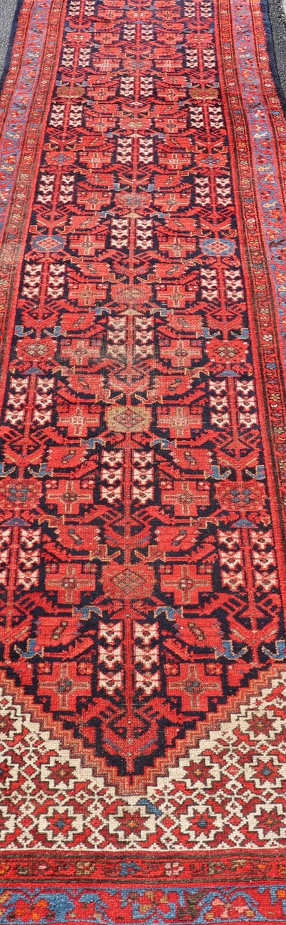 Antique Long Malayer Runner with All - Over Geometric Herati Design This gorgeous antique Malayer Runner features a stunning all - over geometric Herati design set upon a Dark Blue background. The patterns are surrounded by a variety of motifs. The ... - Keivan Woven ArtsPTA - 21006 - 18018