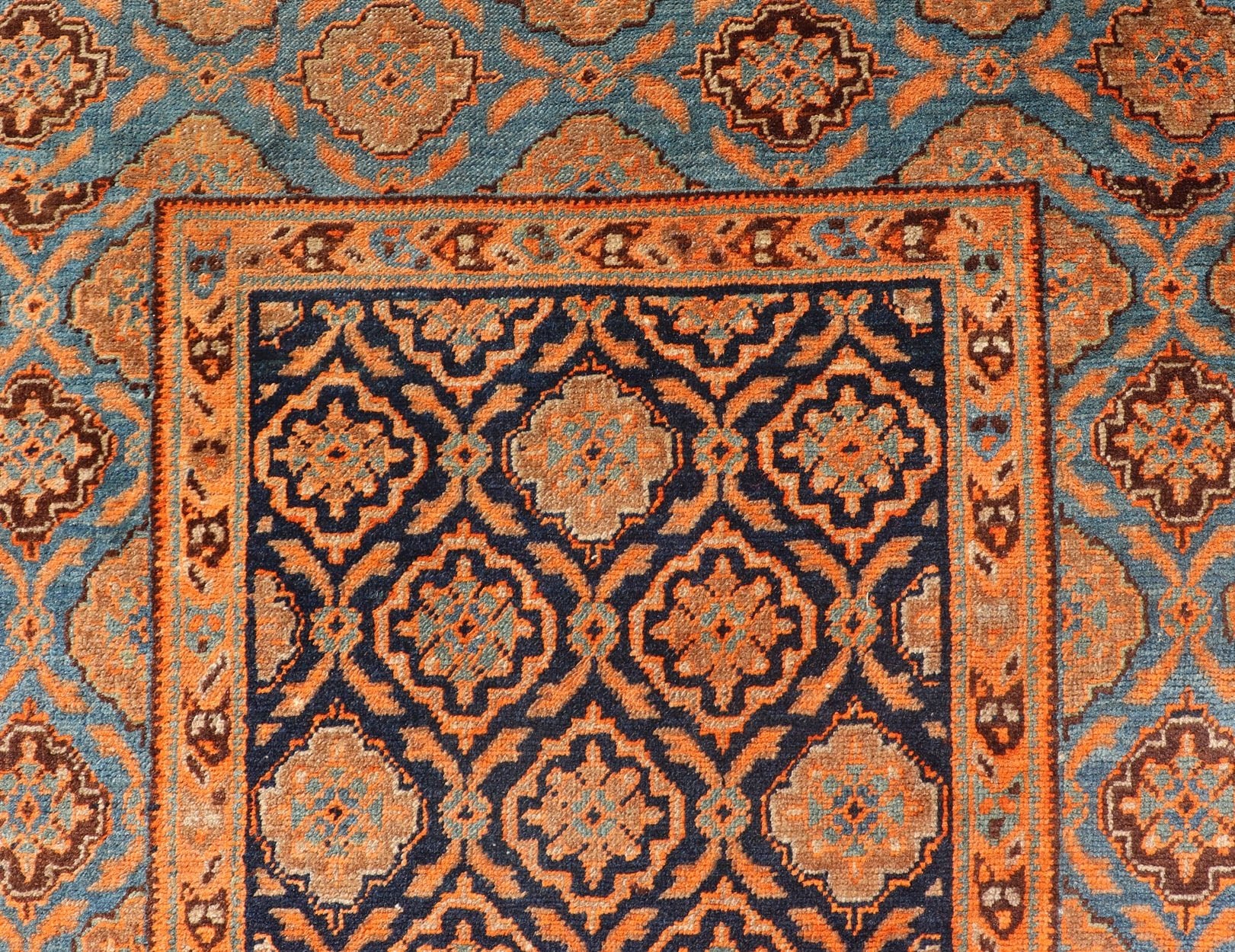 Large Antique Persian Khorasan rug with floral design in navy blue background, blue and orange rug PTA - 21007, country of origin / type: Iran / Khorasan, circa 1910 Keivan Woven Arts Antique Persian Khorasan Runner with All - Over Design in Blue... - Keivan Woven ArtsPTA - 21007 - 18024Rug