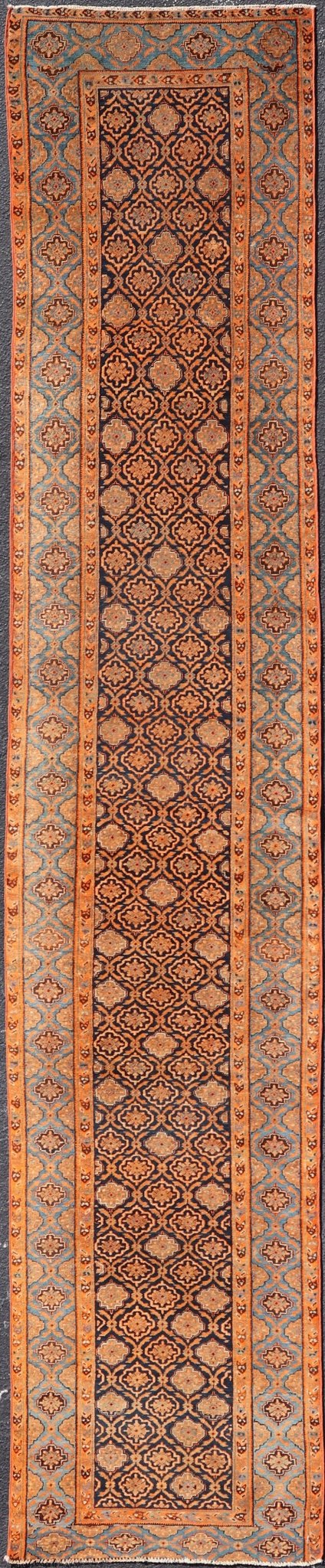 Large Antique Persian Khorasan rug with floral design in navy blue background, blue and orange rug PTA - 21007, country of origin / type: Iran / Khorasan, circa 1910 Keivan Woven Arts Antique Persian Khorasan Runner with All - Over Design in Blue... - Keivan Woven ArtsPTA - 21007 - 18024Rug