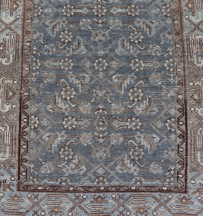 Antique Hand - Knotted Persian Hamadan Runner in Wool with All - Over Floral Design This antique Persian Hamadan rug has been hand - knotted in wool and features an all - over sub - geometric design rendered in multicolor. A complementary, multi - tiered b... - Keivan Woven ArtsPTA - 21011 - 18096