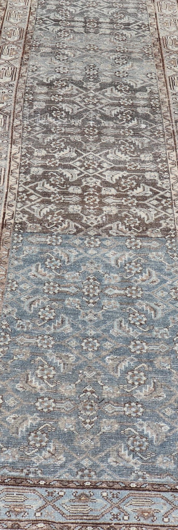Antique Hand - Knotted Persian Hamadan Runner in Wool with All - Over Floral Design This antique Persian Hamadan rug has been hand - knotted in wool and features an all - over sub - geometric design rendered in multicolor. A complementary, multi - tiered b... - Keivan Woven ArtsPTA - 21011 - 18096