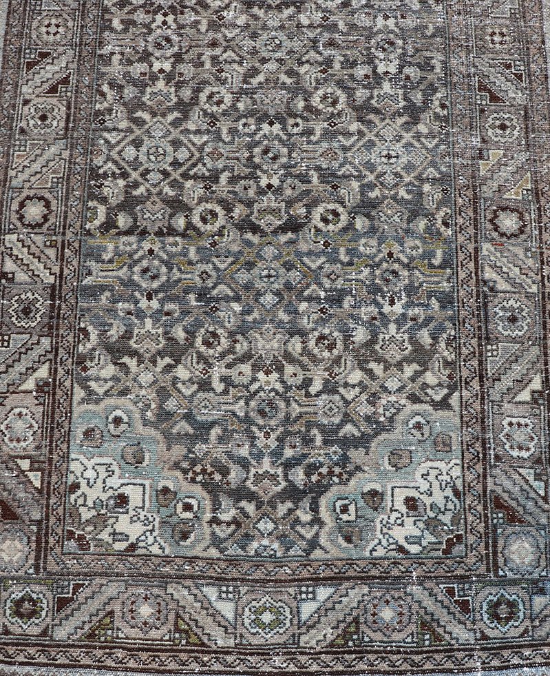 Antique Persian Malayer Hand - Knotted Runner in Wool in Brown, Gray, and Blue This antique Persian Malayer runner is rendered in shades of brown, blue, cream and bronze. The field and the border both hold an all - over design. Measures; 3'... - Keivan Woven ArtsPTA - 21014 - 18108