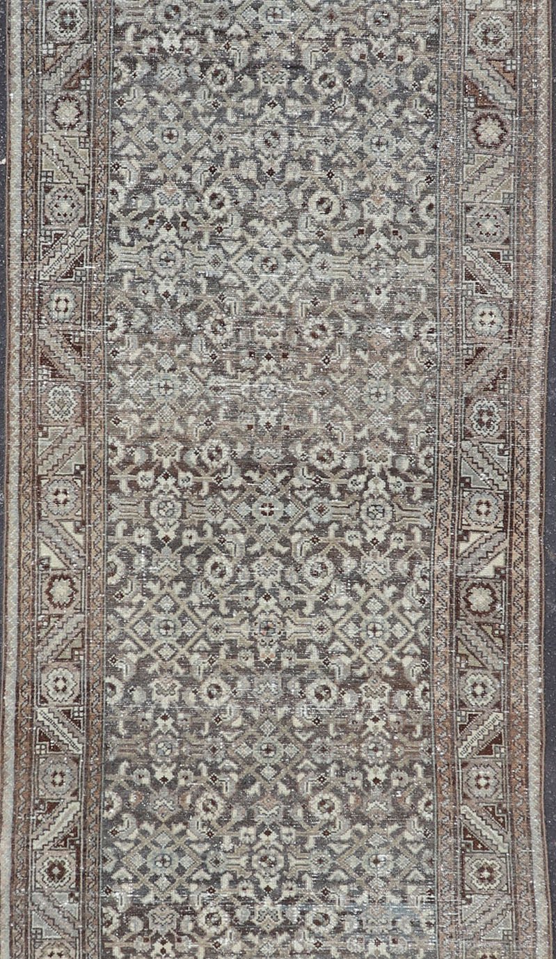 Antique Persian Malayer Hand - Knotted Runner in Wool in Brown, Gray, and Blue This antique Persian Malayer runner is rendered in shades of brown, blue, cream and bronze. The field and the border both hold an all - over design. Measures; 3'... - Keivan Woven ArtsPTA - 21014 - 18108