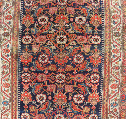 Colorful Antique Malayer Runner with All - Over Herati Design This stunning Antique Malayer features an all - over Herati Design set upon a dark blue background. The herati patterns are surrounded by a variety of splendid motifs, rendered in Ivory,... - Keivan Woven ArtsPTA - 21015 - 18048