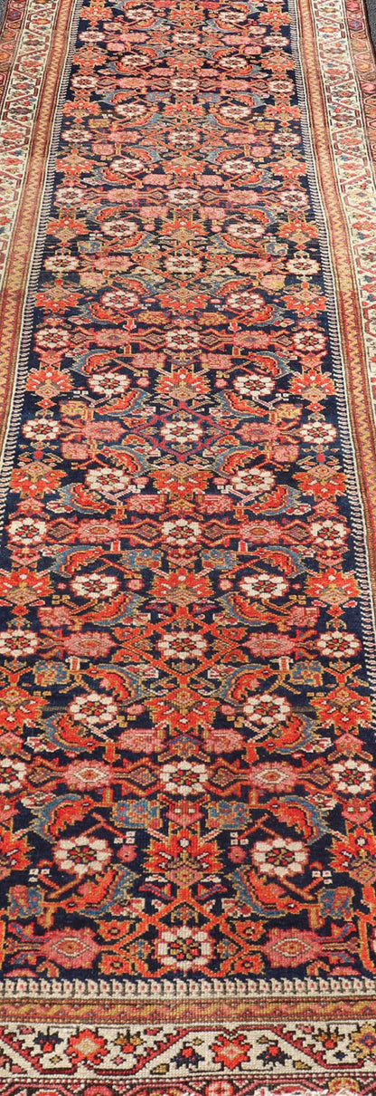 Colorful Antique Malayer Runner with All - Over Herati Design This stunning Antique Malayer features an all - over Herati Design set upon a dark blue background. The herati patterns are surrounded by a variety of splendid motifs, rendered in Ivory,... - Keivan Woven ArtsPTA - 21015 - 18048