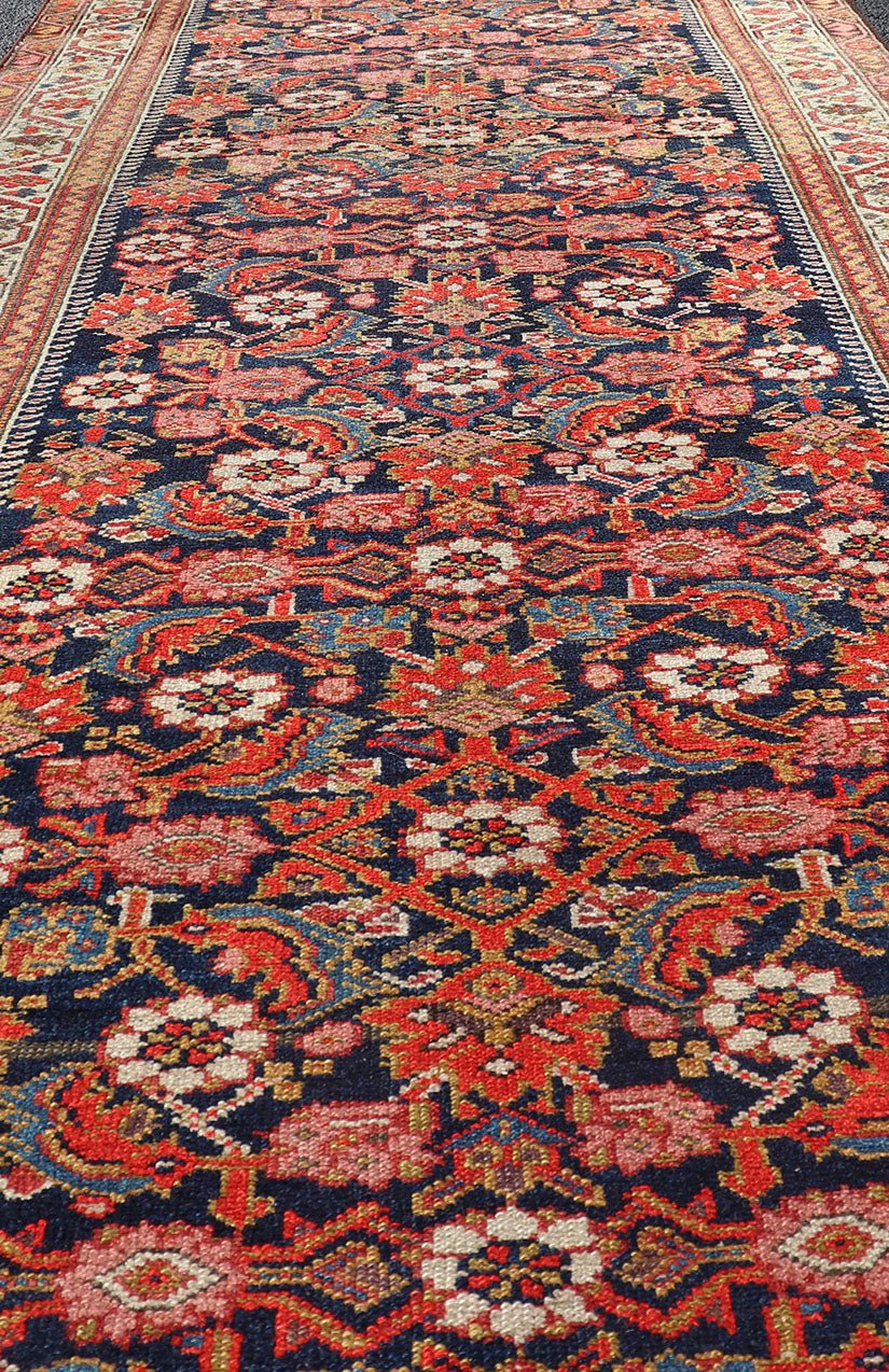 Colorful Antique Malayer Runner with All - Over Herati Design This stunning Antique Malayer features an all - over Herati Design set upon a dark blue background. The herati patterns are surrounded by a variety of splendid motifs, rendered in Ivory,... - Keivan Woven ArtsPTA - 21015 - 18048
