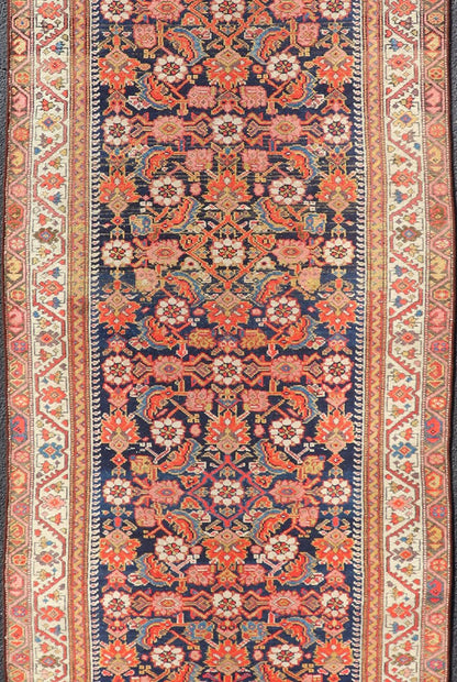 Colorful Antique Malayer Runner with All - Over Herati Design This stunning Antique Malayer features an all - over Herati Design set upon a dark blue background. The herati patterns are surrounded by a variety of splendid motifs, rendered in Ivory,... - Keivan Woven ArtsPTA - 21015 - 18048