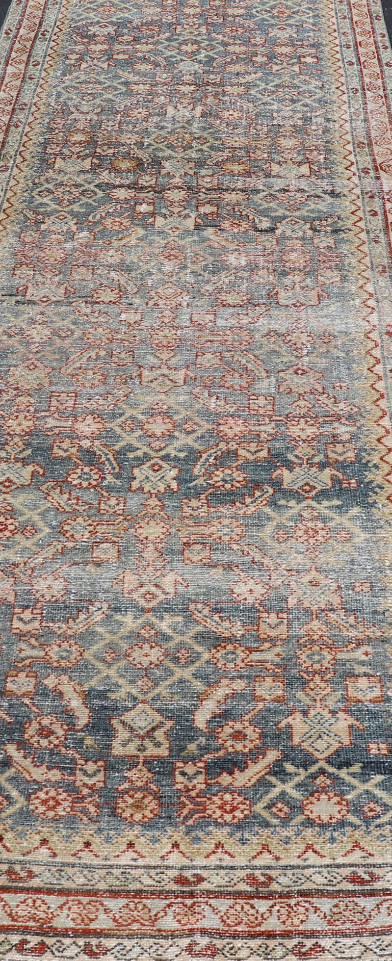 Distressed Antique Persian Malayer Gallery Runner With All - Over Design in Gray, Steel blue and multi colors. Country of Origin: Iran; Type: Malayer; Design: All - Over, Stylized, Floral; Keivan Woven Arts: rug PTA - 21018 Measures 4'2 x 13'2 ... - Keivan Woven ArtsPTA - 21018 - 17370Rug