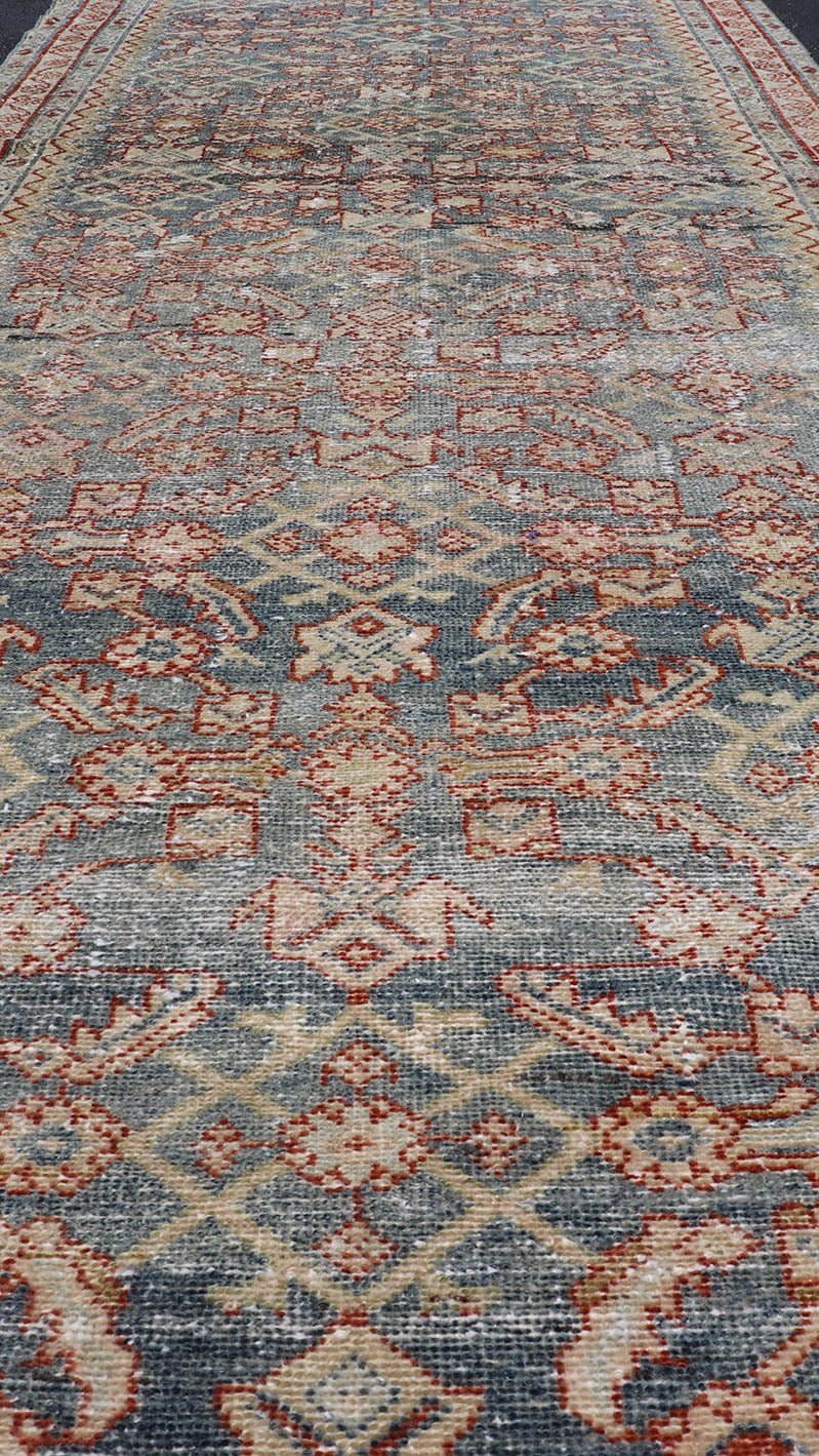 Distressed Antique Persian Malayer Gallery Runner With All - Over Design in Gray, Steel blue and multi colors. Country of Origin: Iran; Type: Malayer; Design: All - Over, Stylized, Floral; Keivan Woven Arts: rug PTA - 21018 Measures 4'2 x 13'2 ... - Keivan Woven ArtsPTA - 21018 - 17370Rug