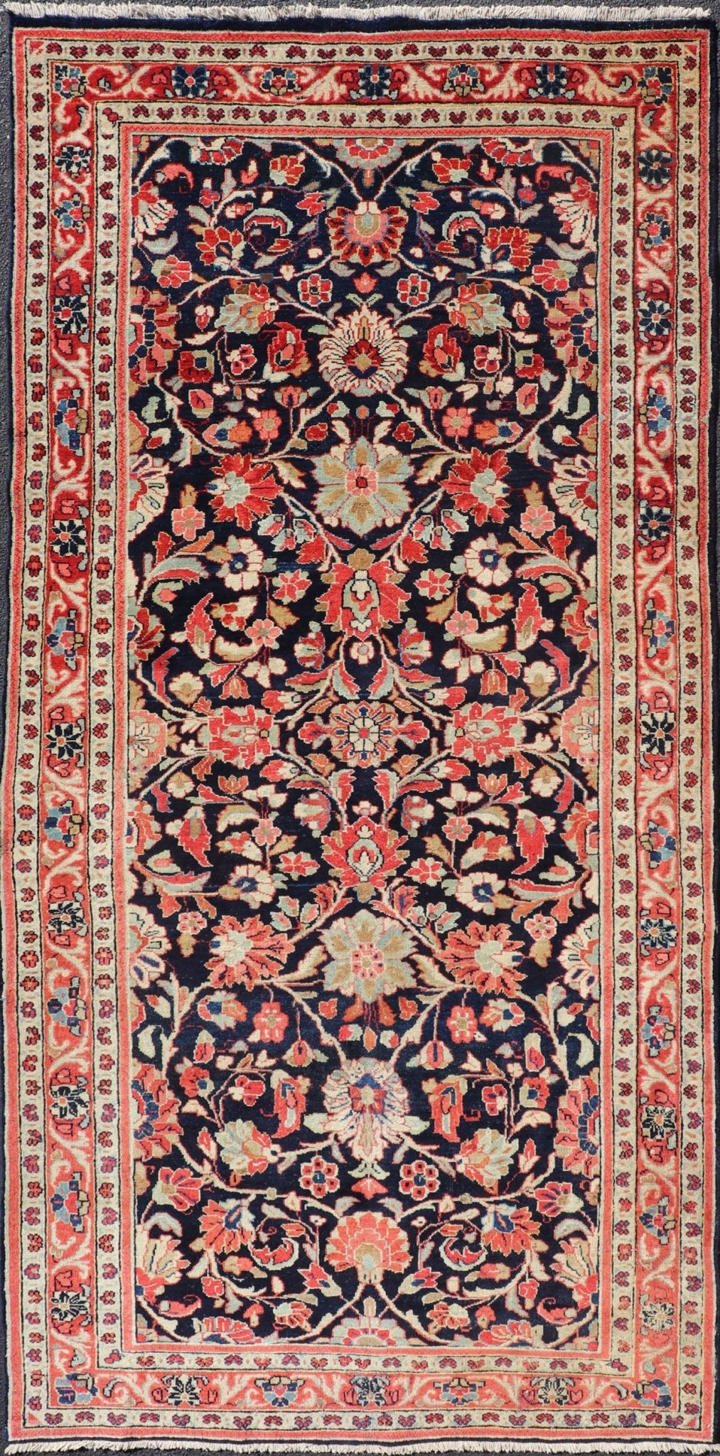 Antique Persian Gallery Runner with Floral Design in D. Blue & Jewel Tones. This lovely antique Gallery Mahal features a stunning all - over floral design set upon a dark blue background, and rendered in Ivory, Coral, varieties of Reds, Greens an... - Keivan Woven ArtsPTA - 21019 - 17376Rug