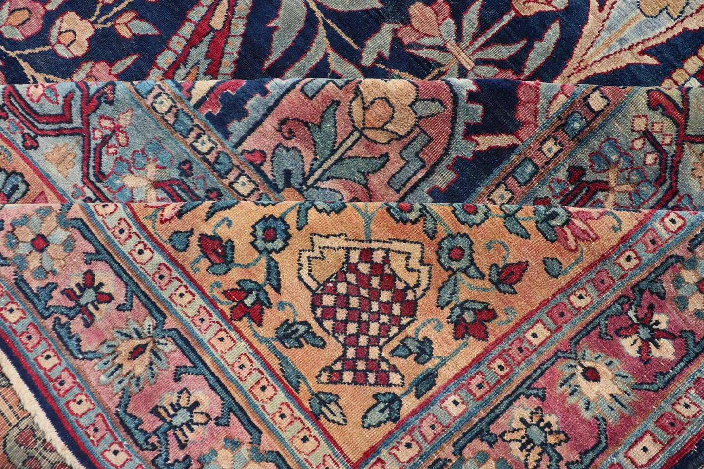 Antique Lavar Kerman Persian Rug with All - Over Floral Design on A Blue Field Measures: 11'7 x 19'2 This magnificent antique Lavar Kerman rug features an exquisite all - over floral design, enclosed within a complementary multi - tiered borde... - Keivan Woven ArtsPTA - 2109 - 11 - 17298