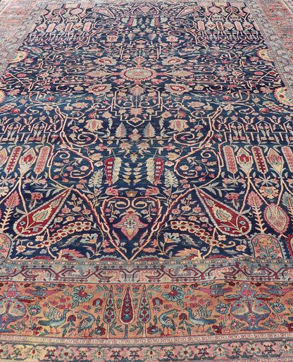 Antique Lavar Kerman Persian Rug with All - Over Floral Design on A Blue Field Measures: 11'7 x 19'2 This magnificent antique Lavar Kerman rug features an exquisite all - over floral design, enclosed within a complementary multi - tiered borde... - Keivan Woven ArtsPTA - 2109 - 11 - 17298