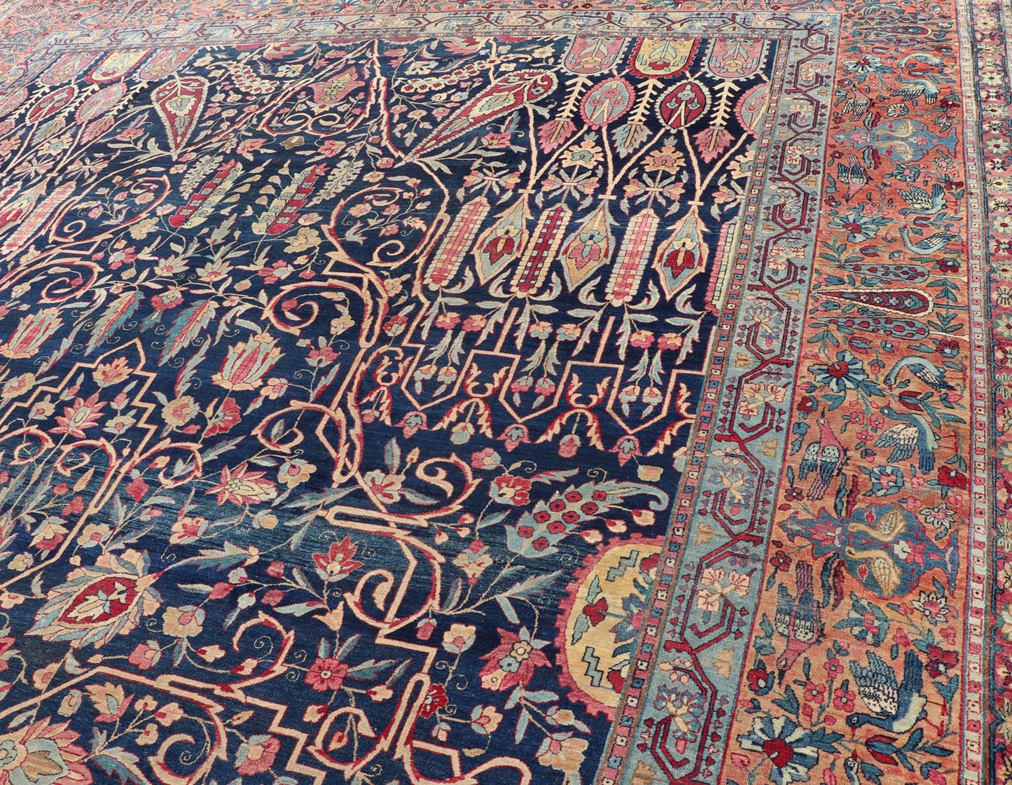 Antique Lavar Kerman Persian Rug with All - Over Floral Design on A Blue Field Measures: 11'7 x 19'2 This magnificent antique Lavar Kerman rug features an exquisite all - over floral design, enclosed within a complementary multi - tiered borde... - Keivan Woven ArtsPTA - 2109 - 11 - 17298