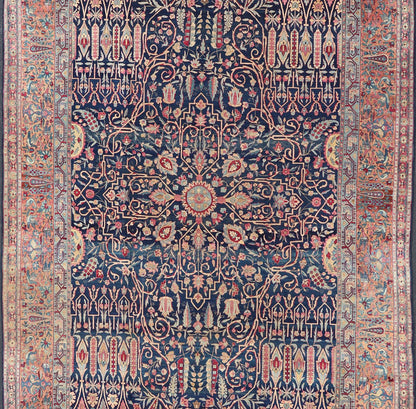 Antique Lavar Kerman Persian Rug with All - Over Floral Design on A Blue Field Measures: 11'7 x 19'2 This magnificent antique Lavar Kerman rug features an exquisite all - over floral design, enclosed within a complementary multi - tiered borde... - Keivan Woven ArtsPTA - 2109 - 11 - 17298